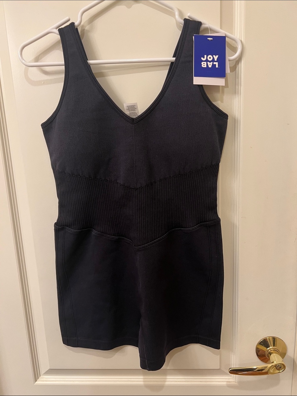 JoyLab Black Ribbed V-Neck Tank Romper with Sporty Silhouette